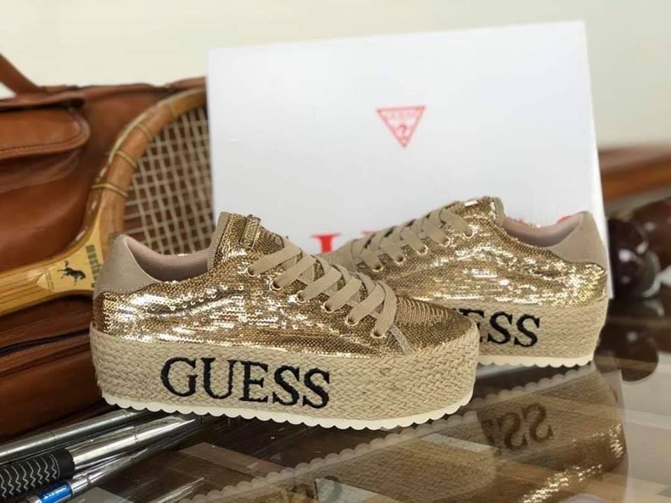 Guess for Sandrini